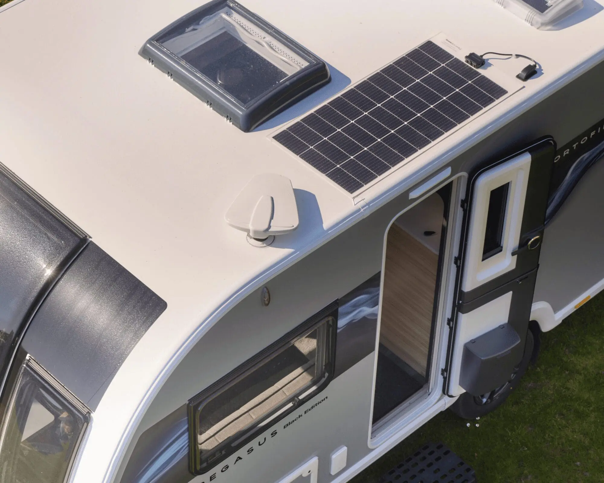 Modern Bailey Caravan Roof with Solar Panel Top view of a Bailey caravan featuring a solar panel and skylight.