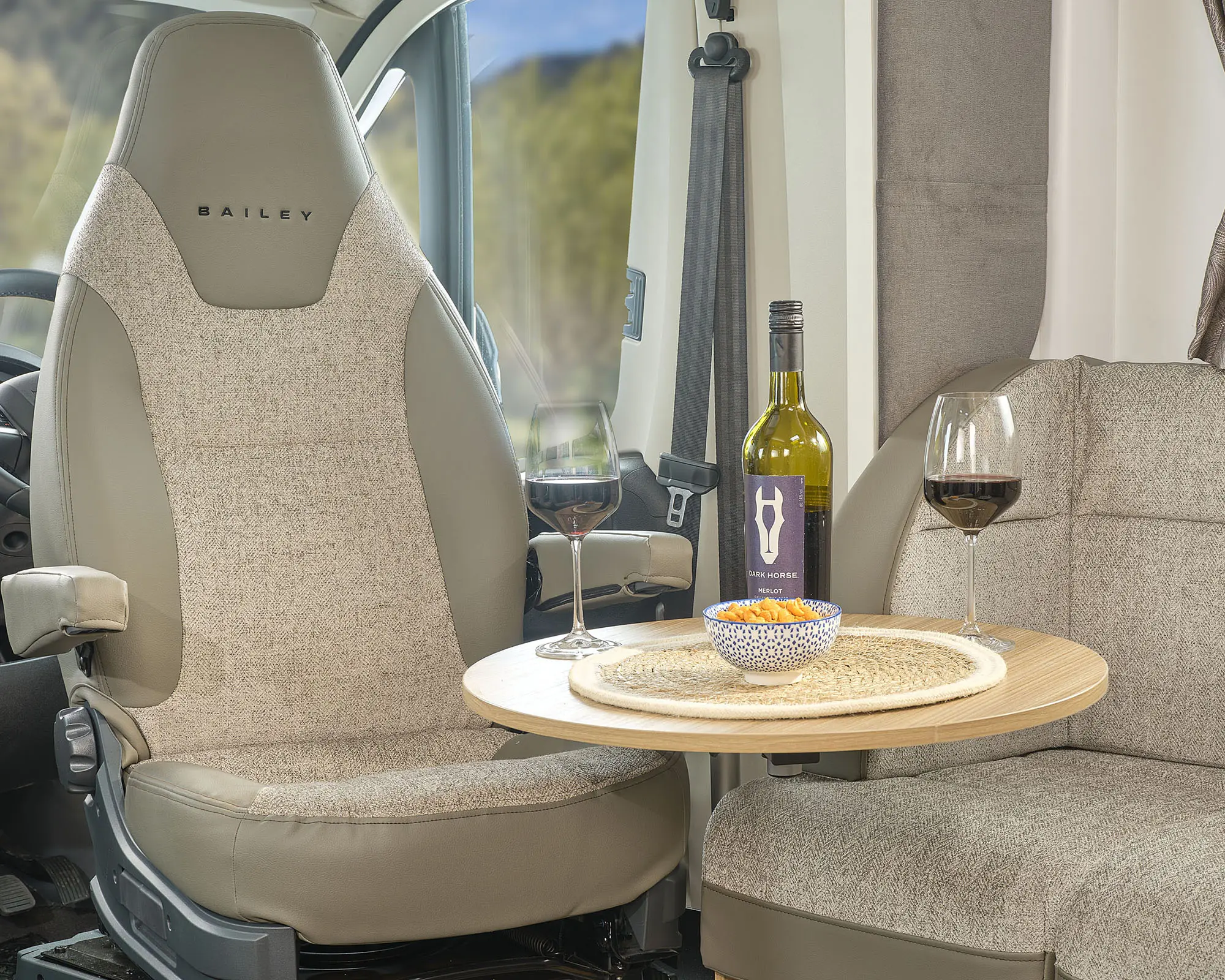 base_0004_Pedestal swing out occasional table offers another lounging area (1)