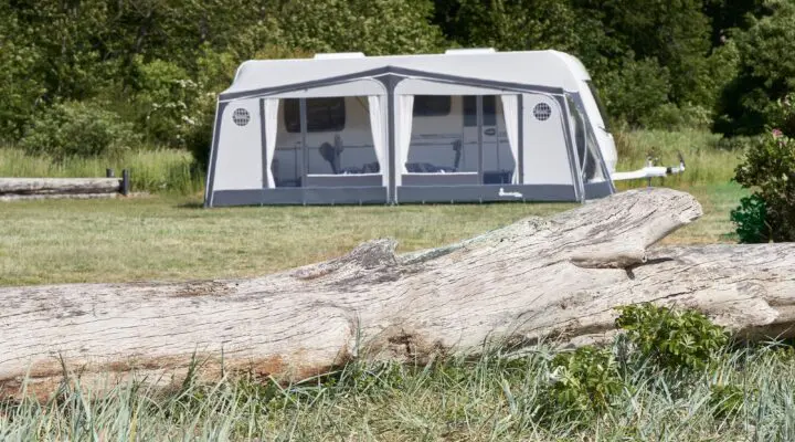 A beautiful Isabella awning set up in a tranquil outdoor setting, perfect for enhancing your caravan or motorhome experience.