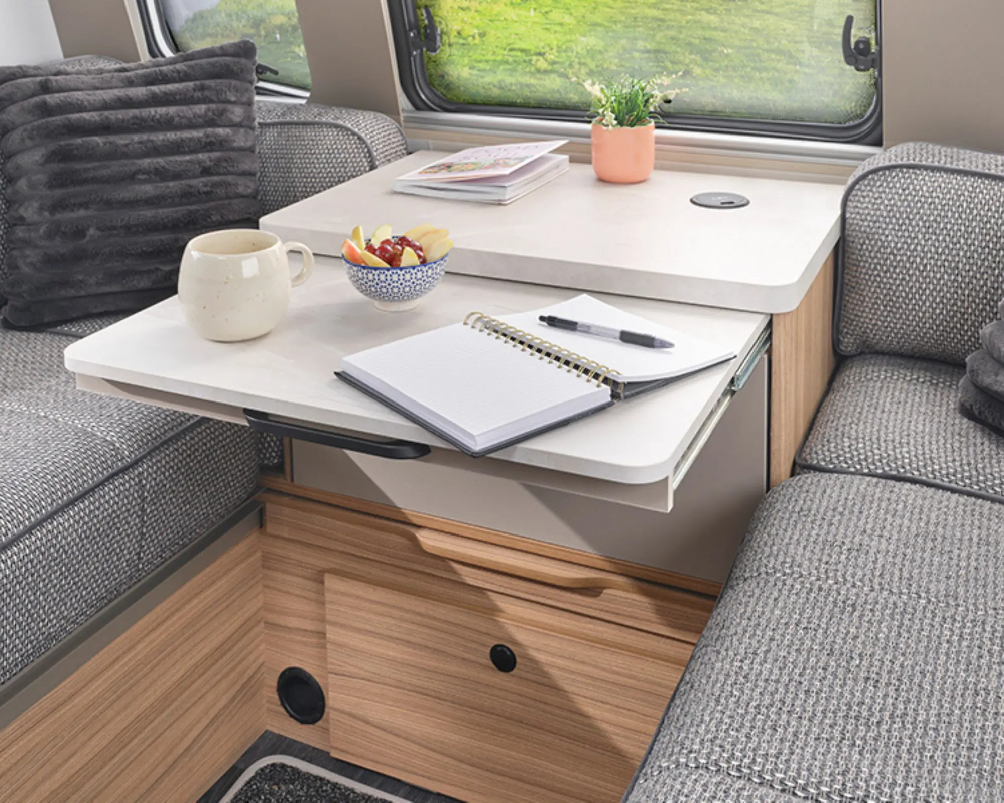 Handy one-drawer front chest provides extra workspace with slide-out occasional table