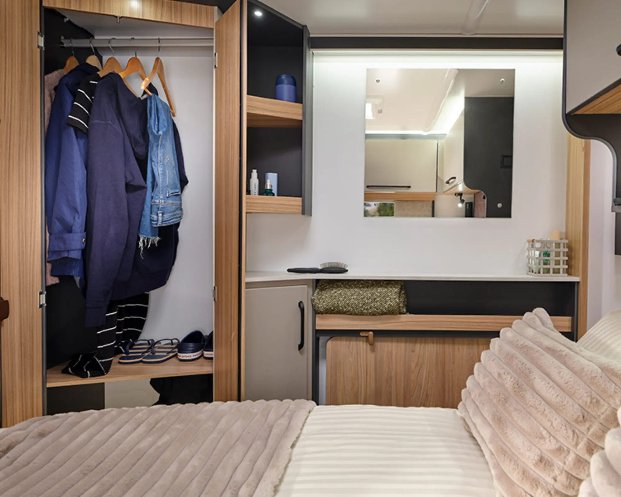 Large corner wardrobe, shelving and vanity unit in the bedroom allows for extra luggage on your travels