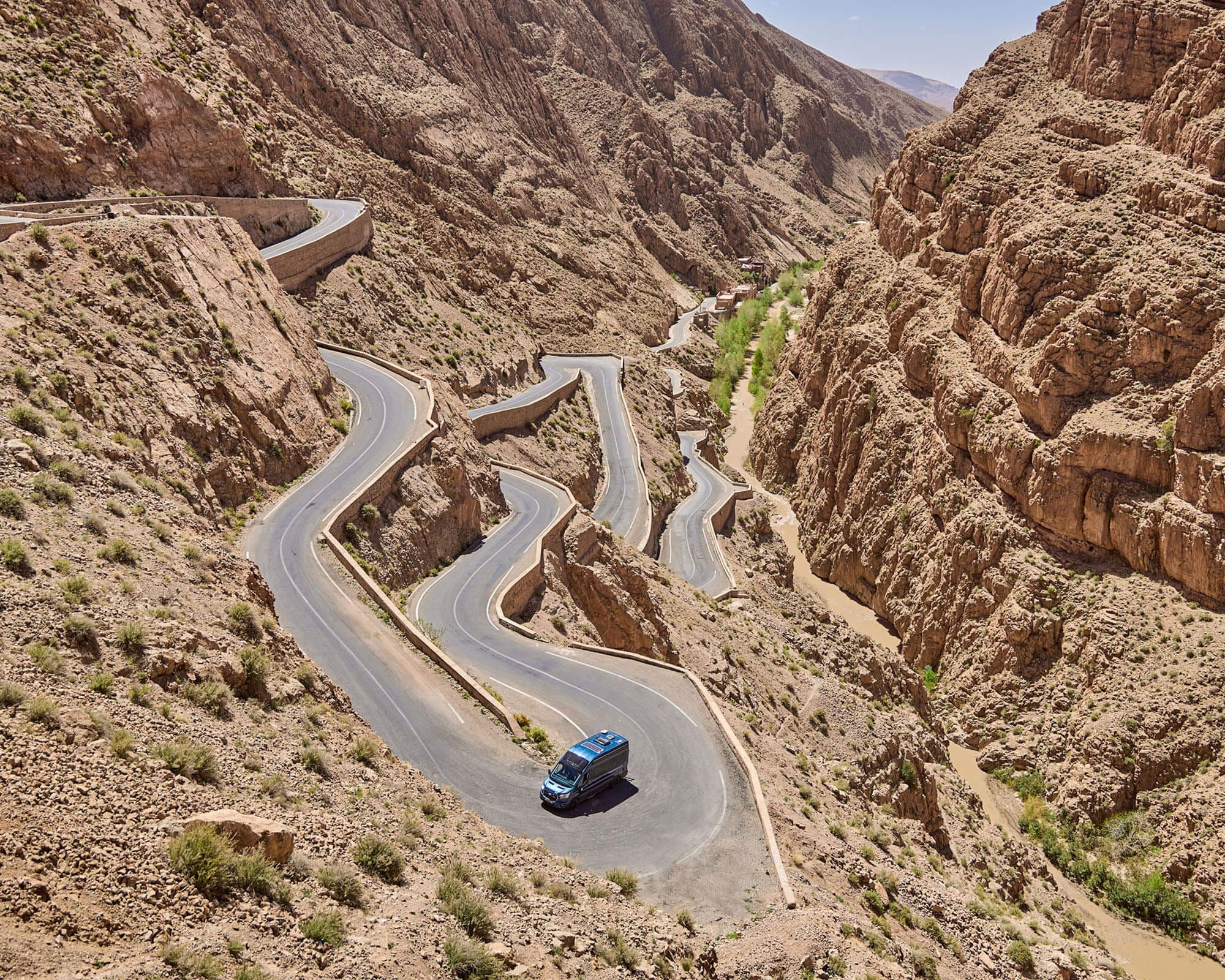 Winding mountain road ideal for caravanning and exploring with a motorhome or campervan.