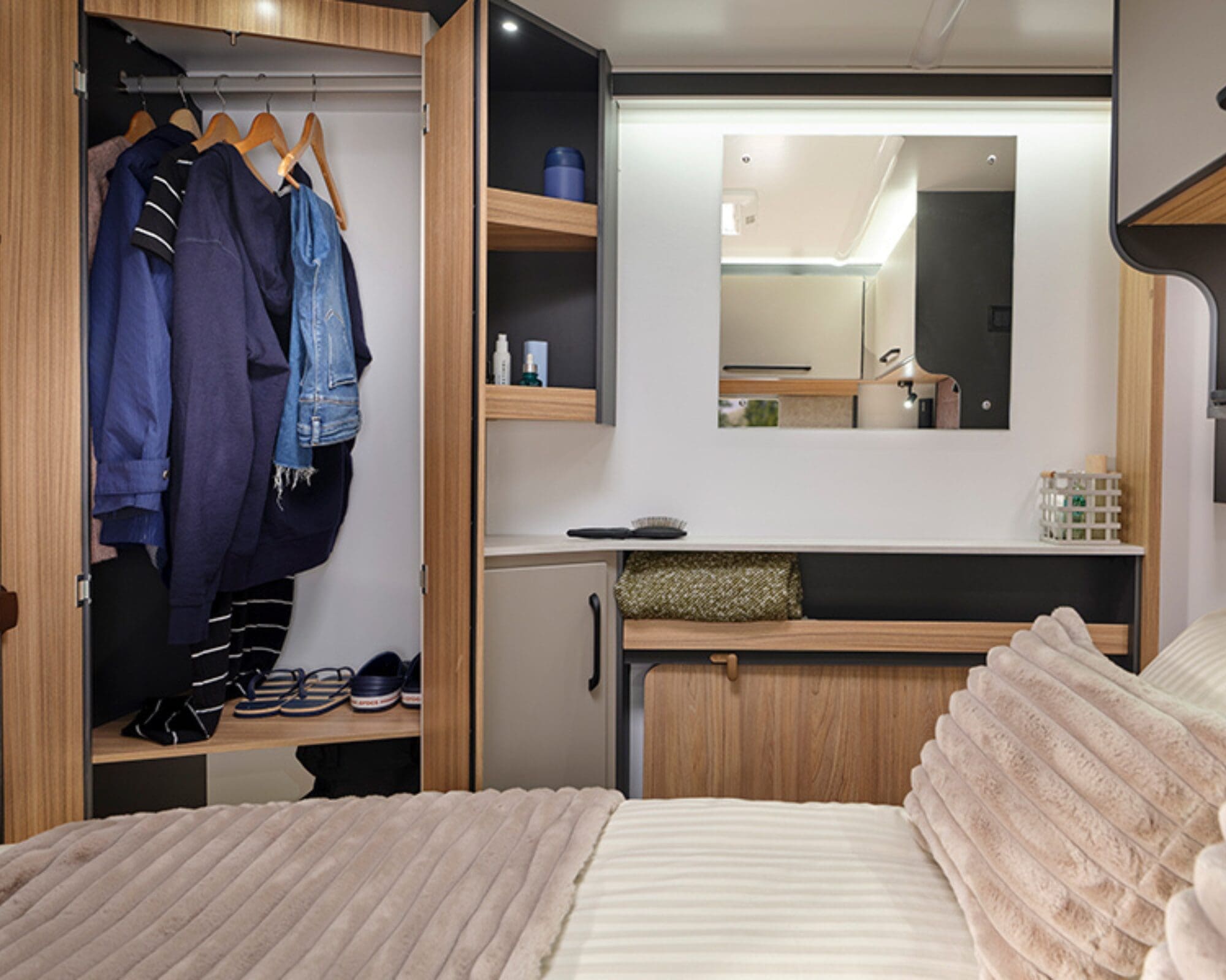 Large corner wardrobe, shelving and vanity unit in the bedroom allows for extra luggage on your travels