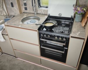 Kitchen with dual-fuel hob, oven and grill in the Bailey Unicorn Deluxe Madrid 2027
