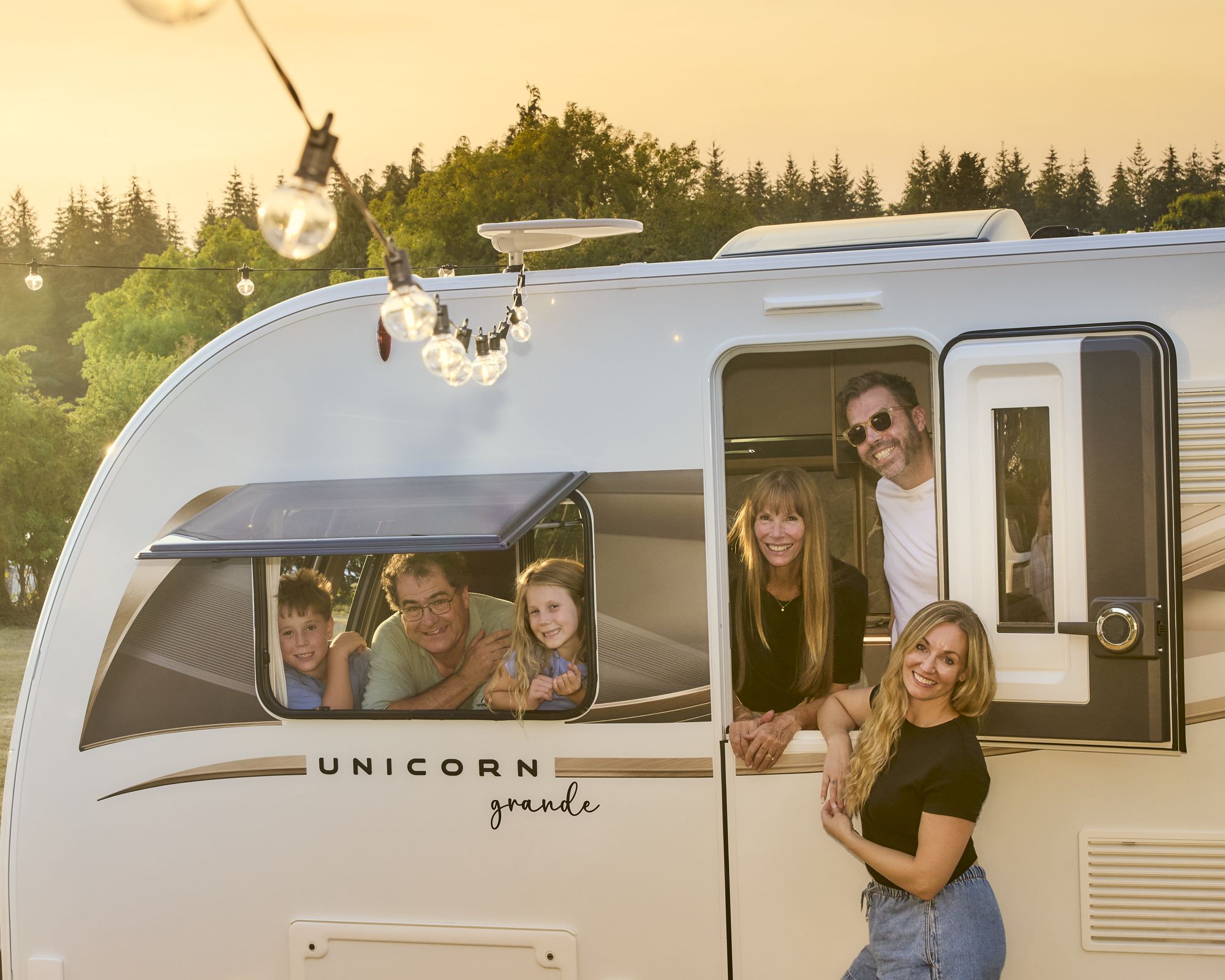 Family at the door of a Bailey Unicorn Grande 2027 caravan