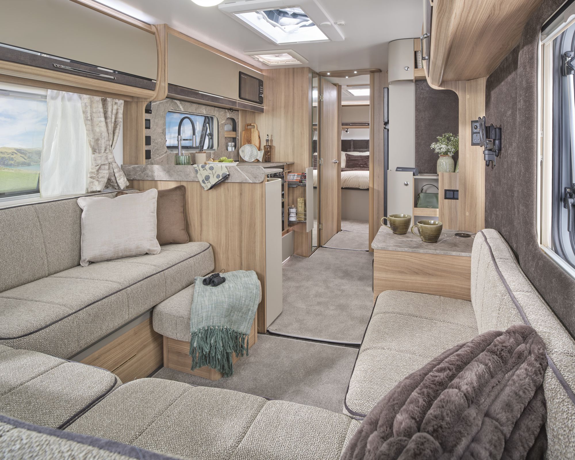 U-shaped lounge and kitchen in the Bailey Unicorn Grande Cornella 2027