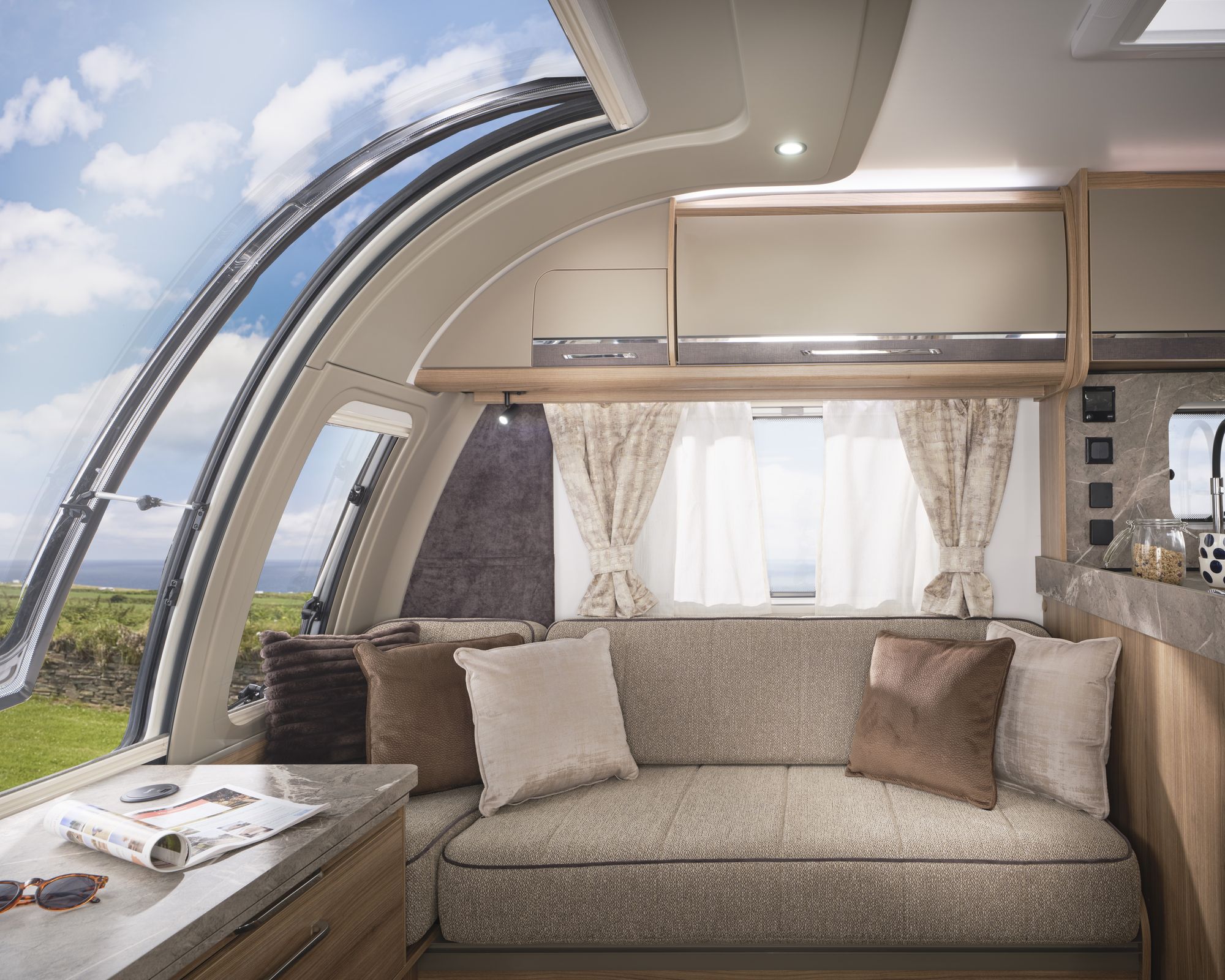 Front lounge beneath the infinity window in the Bailey Unicorn Grande Lucena 2027