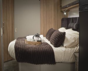 King-size island bed in the Bailey Unicorn Grande Lucena 2027