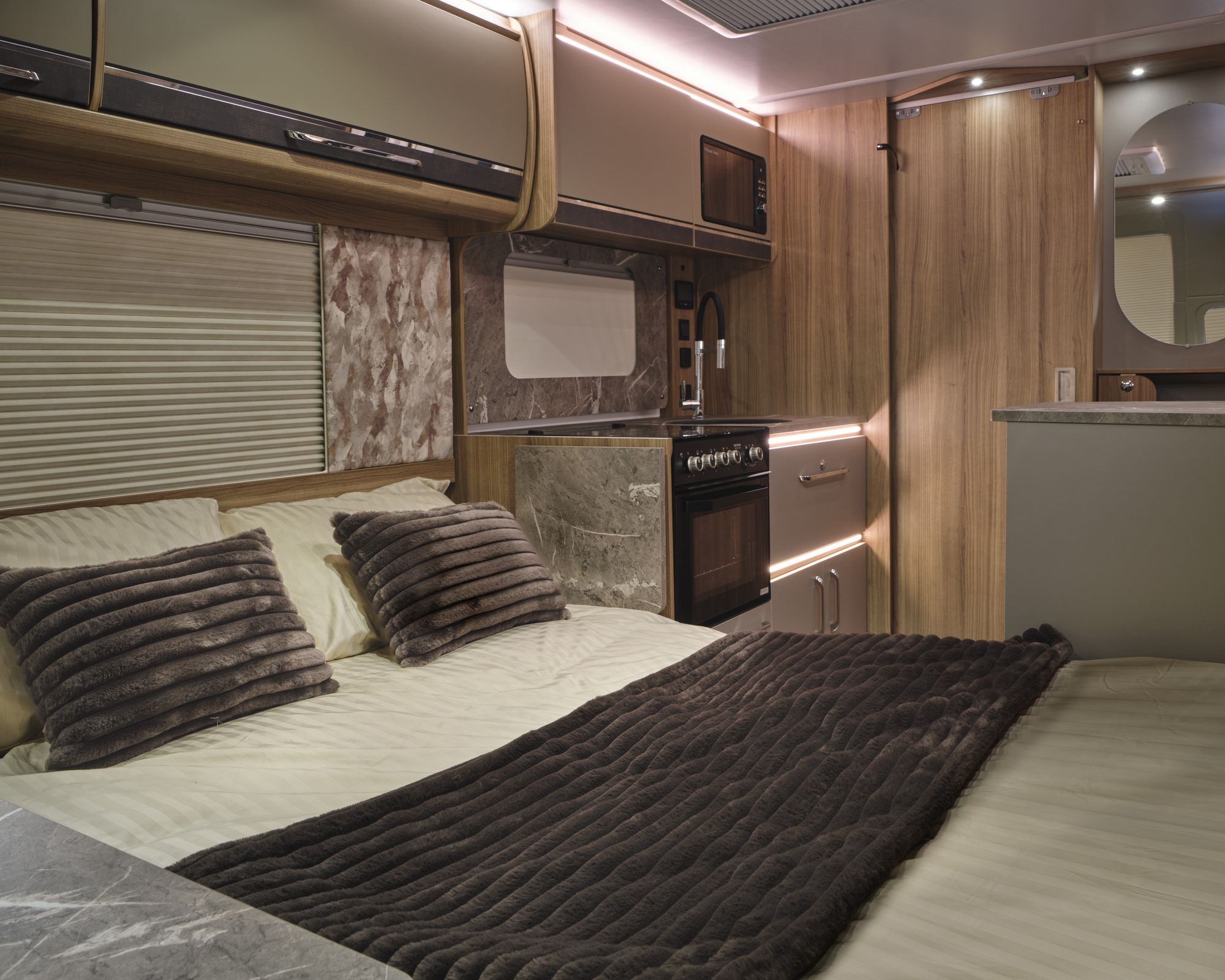 Bailey Unicorn Lite Seville 2027 Double Bed Front lounge made up as a double bed in the Bailey Unicorn Lite Seville 2027