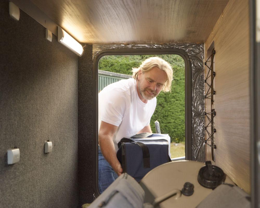 Loading the rear garage of a Bailey Ascent motorhome