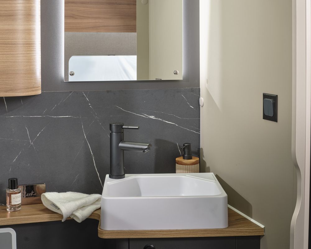 Washroom basin and mirror in a Bailey Ascent motorhome